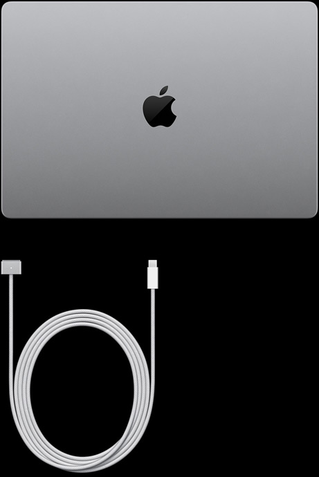 Lukket sølvfarvet MacBook Pro med PROLED XDR-skærm, USB‑C-opladerkabel og strømforsyning