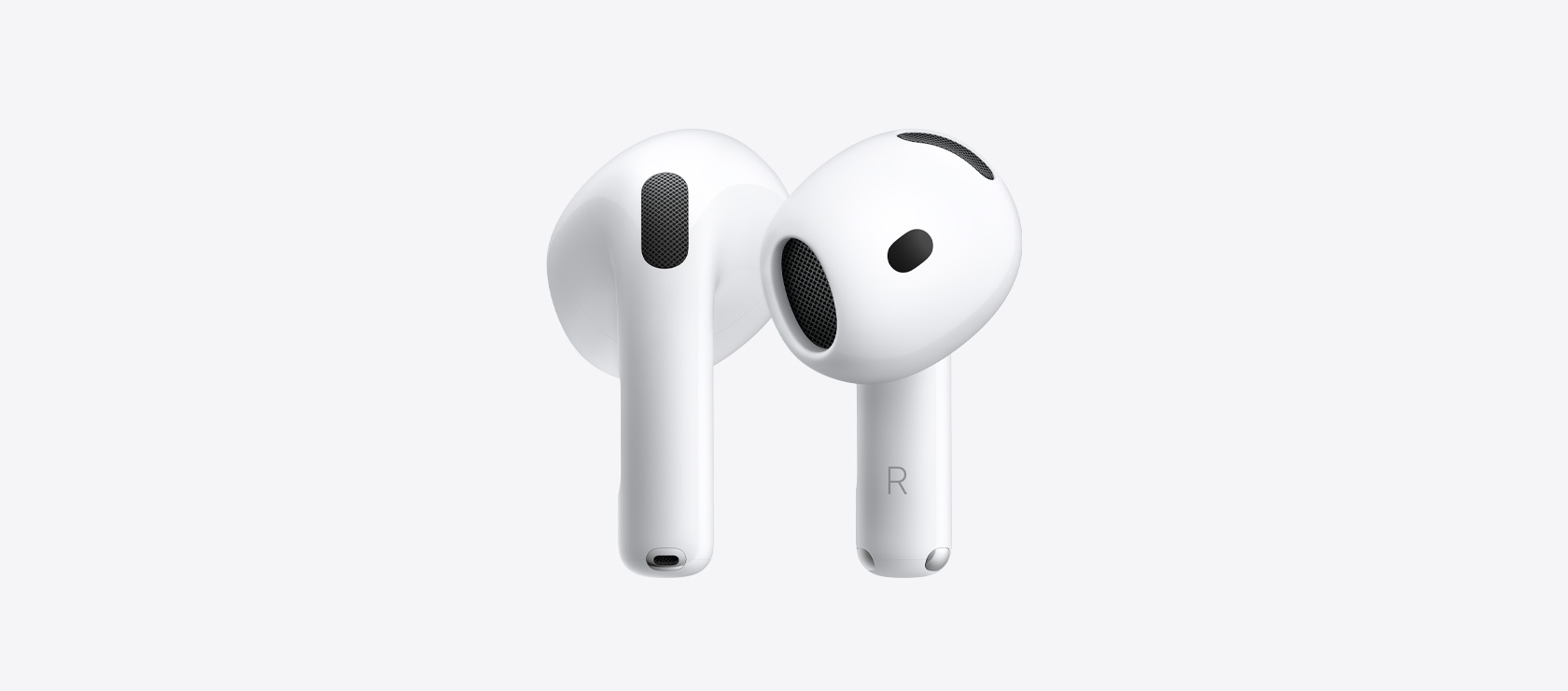 AirPods 5: earbud nirkabel, warna putih, berbentuk oval, eartip dengan jaring speaker akustik interior, gagang pendek dengan konektor pengisian daya perak, indikator huruf kiri dan kanan