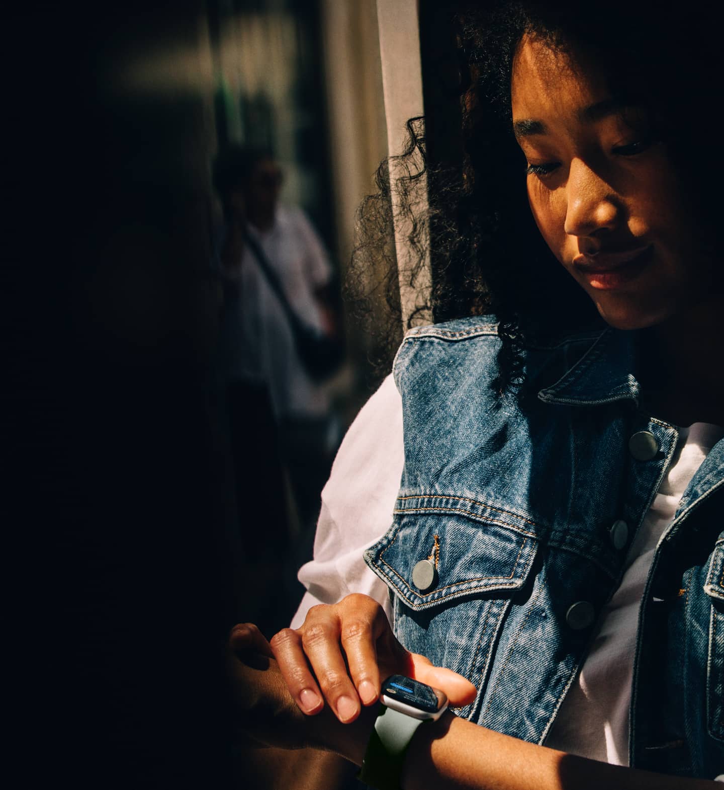 A person checks Messages on Apple Watch Series 11