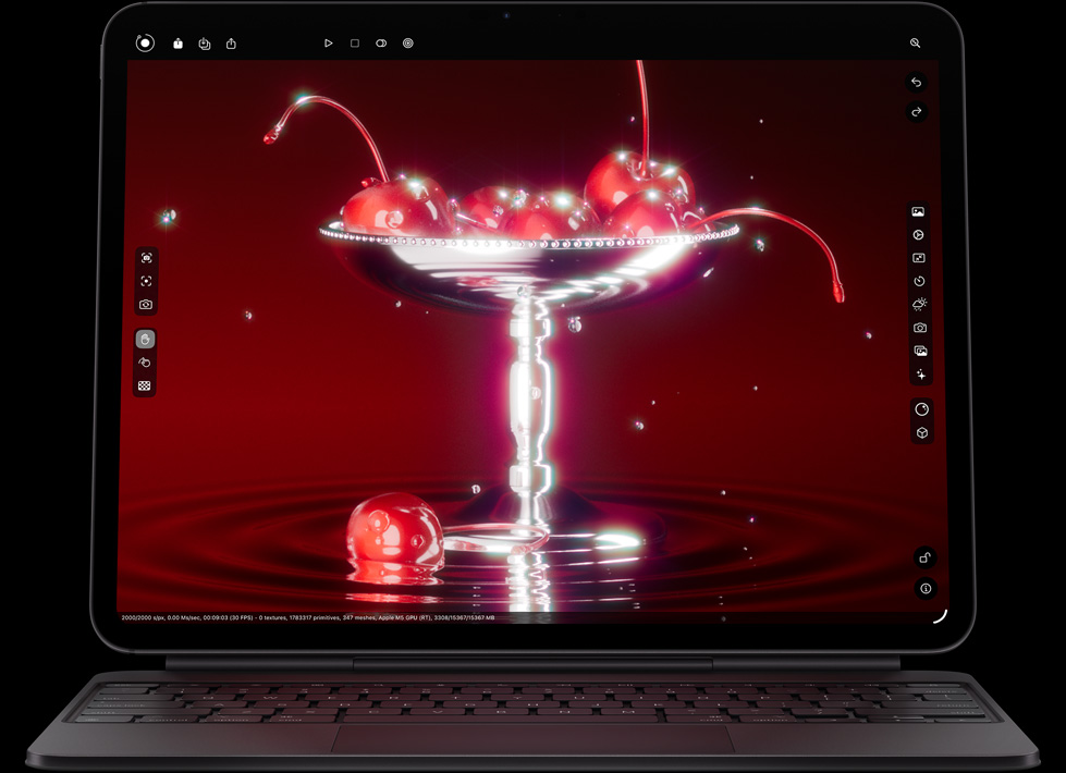 iPad Pro, landscape orientation, front exterior, space black color, rounded corners, black display bezel, attached to Magic Keyboard in landscape orientation, front exterior black color, screen displaying photo editing app with a vibrant image of cherries in a martini glass–shaped bowl with water droplets