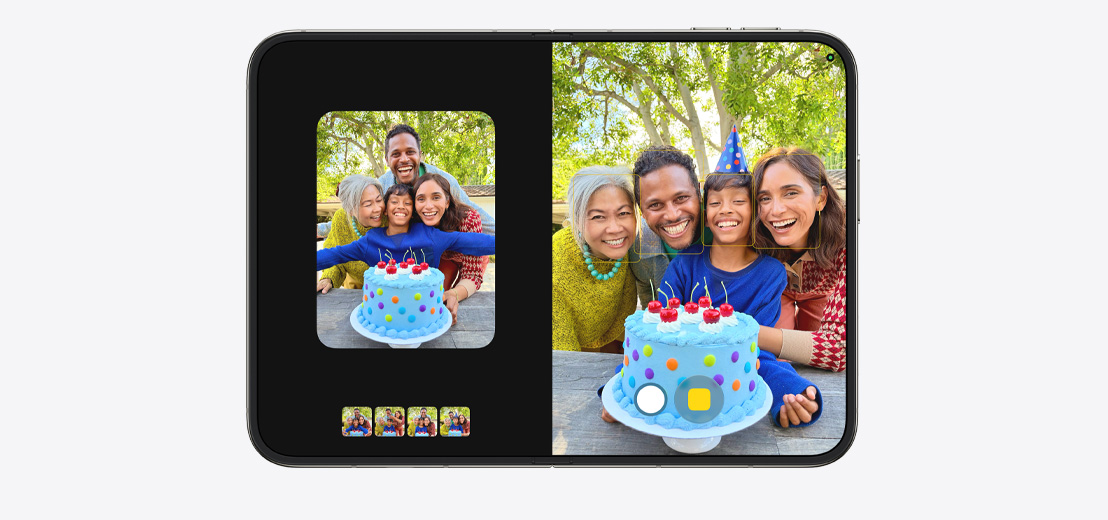 iPhone Duo, opened in a horizontal position, series of iPhone photos side by side on both screens, close-up of an adult and child smiling with a birthday cake.