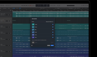 MacBook Pro med Logic Pro, lydspor i bølgeform, Stem Splitter-panel og kategorierne Vocals, Drums, Bass og Other, som alle vises med separate lydbølger