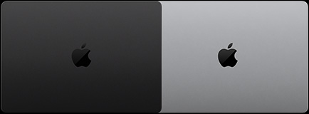 Lukket MacBook Pro med PROLED XDR-skærm, space black, vist ovenfra og lukket MacBook Pro med PROLED XDR-skærm, sølvfarvet, vist ovenfra
