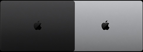 Lukket MacBook Pro med PROLED XDR-skærm, space black, vist ovenfra og lukket MacBook Pro med PROLED XDR-skærm, sølvfarvet, vist ovenfra